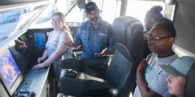 Captain with students