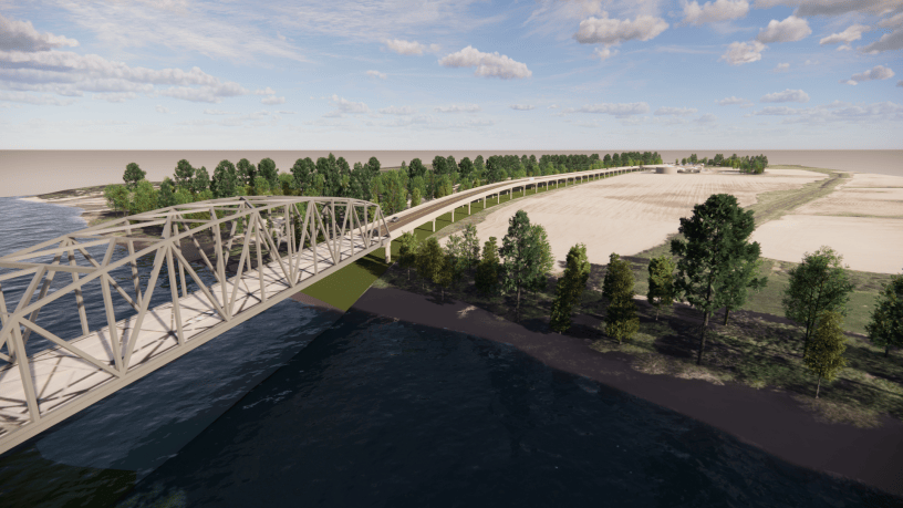 A photo of a bridge over a river with a mostly clear sky in the upper portion of the photo.